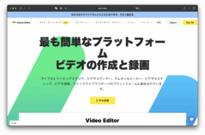 FAITES SIGNE DE LA MAIN. Le site japonais de VIDÉO apparaîtra, avec un texte noir en gros favorisant la création et l’enregistrement vidéo faciles, des formes géométriques colorées en arrière-plan, et un bouton jaune proéminent indiquant « Création vidéo ».